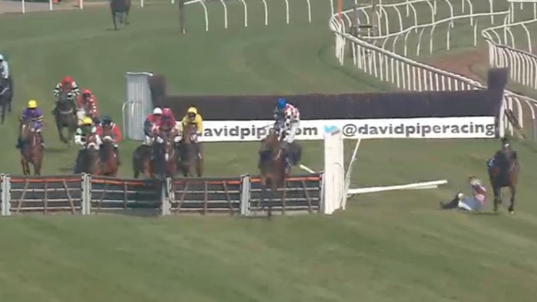 San Giovanni gallops away unharmed as Brendan Powell (blue cap) begins to meet some trouble of his own on Extraordinary Man