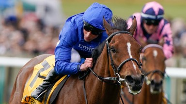 NEWMARKET, ENGLAND - MAY 01: William Buick riding With The Moonlight (blue) win The Betfair Pretty Polly Stakes at Newmarket Racecourse on May 01, 2022 in Newmarket, England. (Photo by Alan Crowhurst/Getty Images)