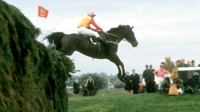 Crisp and Richard Pitman clear Becher's Brook on the second circuit of the 1973 Grand National