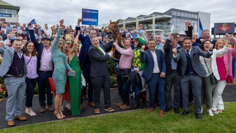 The Magic Lads syndicate celebrate Magic Chegaga's victory on the Colm Quinn BMW Mile in Galway