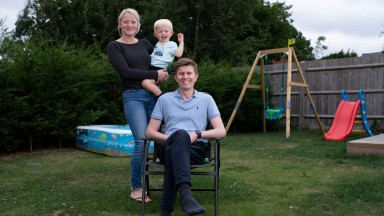 Josh Moore at home with his wife Phoebe and son Freddie2.8.22 Pic: Edward Whitaker