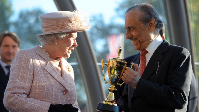 The Queen presenting Prince Khalid Abdullah with the winner's trophy after Frankel's QEII success in 2011