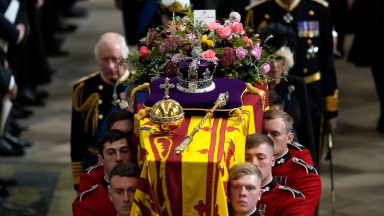 LONDON, ENGLAND - SEPTEMBER 19: King Charles III and Camilla, the Queen Consort follow the coffin of Queen Elizabeth II is carried out of Westminster Abbey after the State Funeral on September 19, 2022 in London, England. Elizabeth Alexandra Mary Windsor