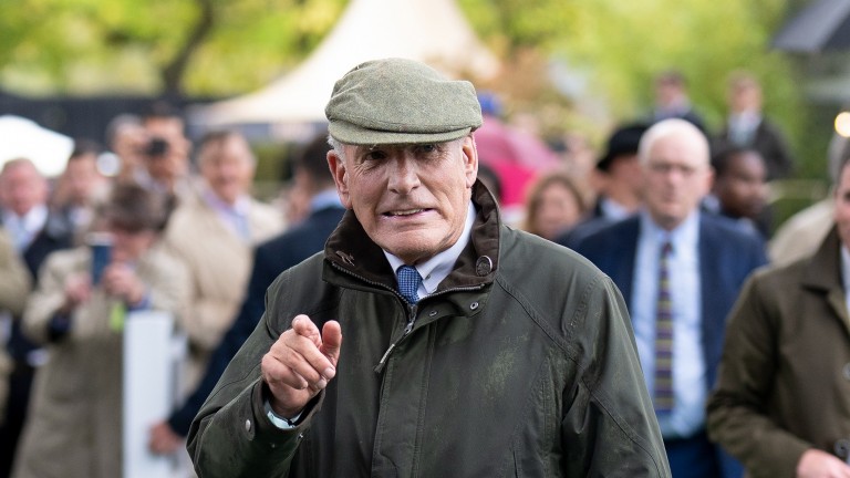 Trainer Sir Mark Prescott points to the camera after Alpinista's magnificent Arc triumph