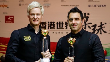 Neil Robertson (left) poses with his trophy after beating Ronnie O'Sullivan in the final of the 2017 Hong Kong Masters