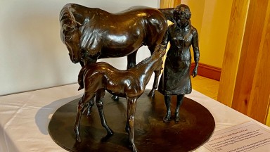 The bronze maquette of the Queen with mare and foal on display at Tattersalls