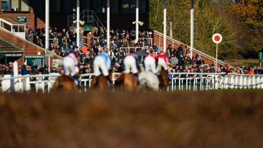 TAUNTON, ENGLAND - DECEMBER 08: A general view as runners pass the grandstands at Taunton Racecourse on December 08, 2022 in Taunton, England. (Photo by Alan Crowhurst/Getty Images)